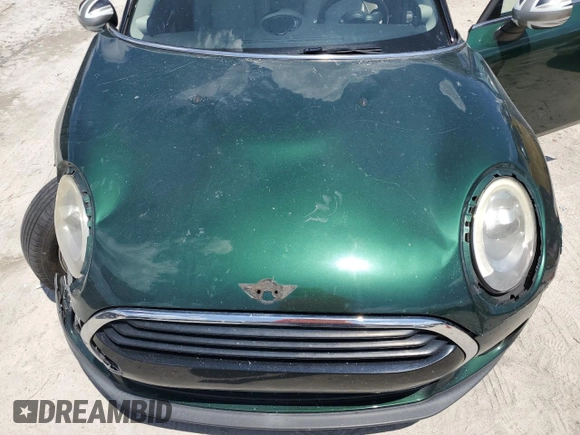 2016 MINI Clubman z VIN WMWLN5C5XG2E29275, wystawiony jako Copart lot #68162014 z przebiegiem 79 754 mil mil oraz Nie do naprawy. Historia ofert i sprzedaży dostępna na DreamBid. Obrazek 11.