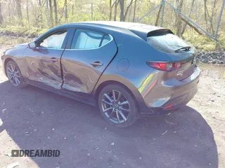 2020 Mazda 3 with VIN JM1BPBLMXL1160464, listed as a IAAI auction lot 42127954 with 70,073 mi miles and . Bid and sale history available at DreamBid. Image 3.