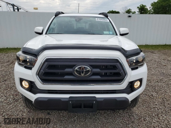 2023 Toyota Tacoma SR with VIN 3TMCZ5AN2PM642205, listed as a Copart auction lot 61045955 with 10,596 mi miles and Salvage title. Bid and sale history available at DreamBid. Image 5.