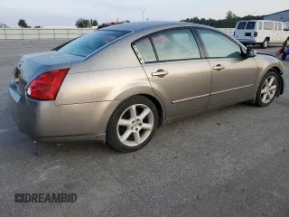 2004 Nissan Maxima SE with VIN 1N4BA41E24C878448, listed as a Copart auction lot 72596984 with 329,525 mi miles and Salvage Title. Bid and sale history available at carsss.com. Image 3.
