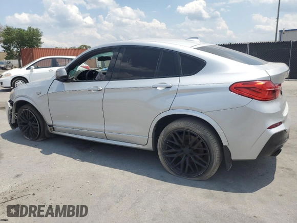 2018 BMW X4 M40i z VIN 5UXXW7C55J0W63724, wystawiony jako Copart lot #55757755 z przebiegiem 149 480 mil mil oraz Tytuł czysty. Historia ofert i sprzedaży dostępna na DreamBid. Obrazek 2.