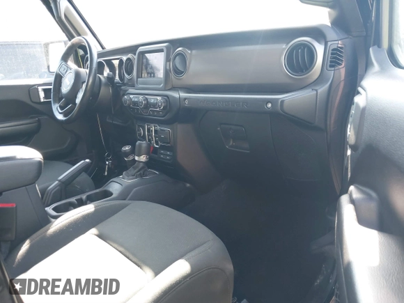 2020 Jeep Wrangler Unlimited Black and Tan with VIN 1C4HJXDGXLW219078, listed as a IAAI auction lot 41783437 with 59,137 mi miles and . Bid and sale history available at DreamBid. Image 5.