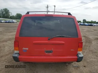 1999 Jeep Cherokee Sport with VIN 1J4FF68S4XL580048, listed as a Copart auction lot 62546365 with 154,059 mi miles and Clean title. Bid and sale history available at DreamBid. Image 6.