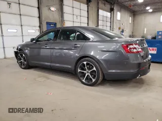 2015 Ford Taurus SEL with VIN 1FAHP2E81FG167546, listed as a Copart auction lot 49114795 with 185,587 mi miles and Salvage Title. Bid and sale history available at carsss.com. Image 2.