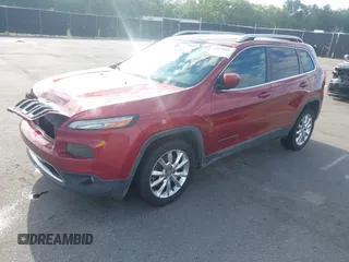 2016 Jeep Cherokee Limited with VIN 1C4PJLDSXGW127497, listed as a IAAI auction lot 42173536 with 240,866 mi miles and . Bid and sale history available at DreamBid. Image 2.