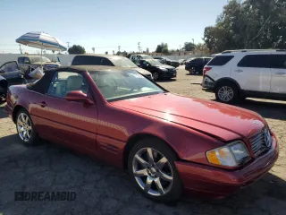 1999 Mercedes-Benz SL-Class with VIN WDBFA68F3XF184908, listed as a Copart auction lot 77165784 with 67,408 mi miles and Salvage Title. Bid and sale history available at carsss.com. Image 4.
