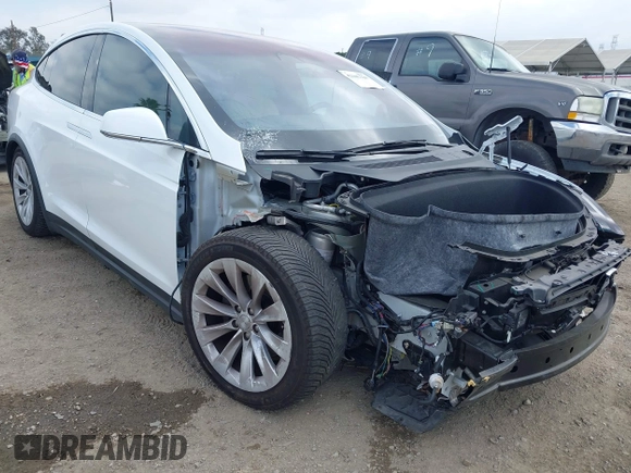 2020 Tesla Model X Long Range with VIN 5YJXCDE26LF238982, listed as a IAAI auction lot 42100220 with 44,804 mi miles. Bid and sale history available at carsss.com. Image 1.