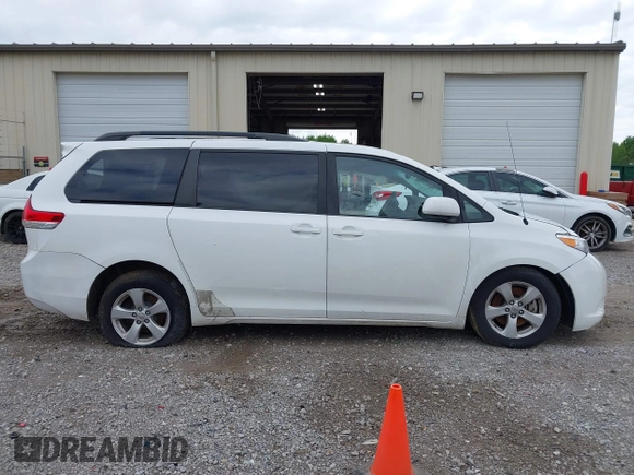 2011 Toyota Sienna LE AAS with VIN 5TDKK3DC6BS091557, listed as a IAAI auction lot 42170157 with 398,019 mi miles and . Bid and sale history available at DreamBid. Image 12.