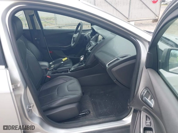 2015 Ford Focus Titanium with VIN 1FADP3N27FL228549, listed as a IAAI auction lot 41912941 with 69,025 mi miles. Bid and sale history available at carsss.com. Image 5.