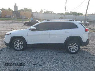 2018 Jeep Cherokee Latitude with VIN 1C4PJLCB3JD552189, listed as a IAAI auction lot 42350120 with 135,627 mi miles and . Bid and sale history available at DreamBid. Image 14.