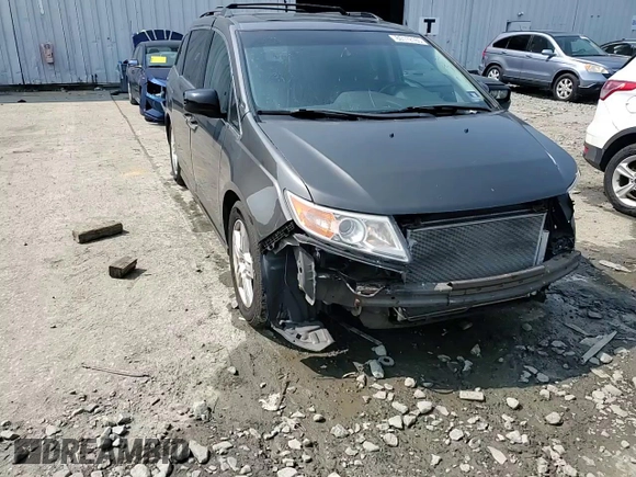2013 Honda Odyssey Touring with VIN 5FNRL5H93DB017932, listed as a Copart auction lot 60112165 with 110,761 mi miles and Salvage title. Bid and sale history available at DreamBid. Image 15.