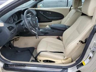 2009 BMW 6 Series 650i with VIN WBAEB53599CX64829, listed as a Copart auction lot 75694824 with 0 mi miles and Salvage Title. Bid and sale history available at carsss.com. Image 7.
