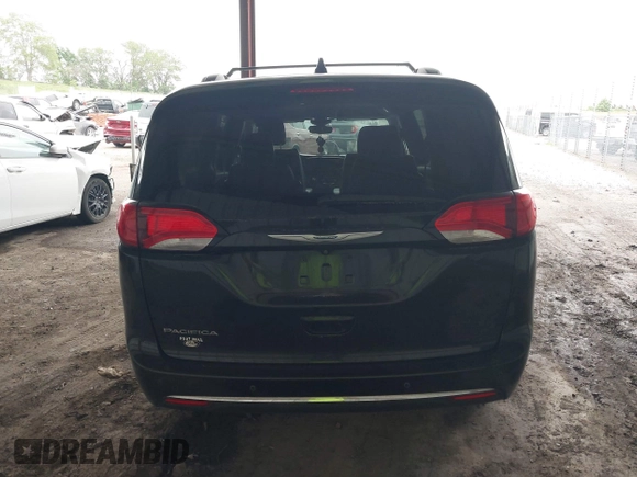 2018 Chrysler Pacifica Touring L z VIN 2C4RC1BG8JR211405, wystawiony jako IAAI lot #42301088 z przebiegiem 92 876 mil mil oraz . Historia ofert i sprzedaży dostępna na DreamBid. Obrazek 16.