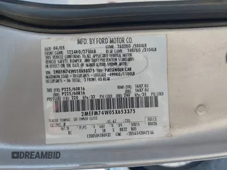2005 Mercury Grand Marquis GS with VIN 2MEFM74W05X653375, listed as a IAAI auction lot 41995502 with 200,083 mi miles and . Bid and sale history available at DreamBid. Image 9.
