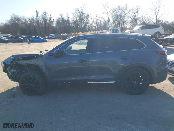 2021 Mazda CX-9 Grand Touring with VIN JM3TCBDY2M0530533, listed as a IAAI auction lot 41309425 with 84,747 mi miles. Bid and sale history available at carsss.com. Image 15.