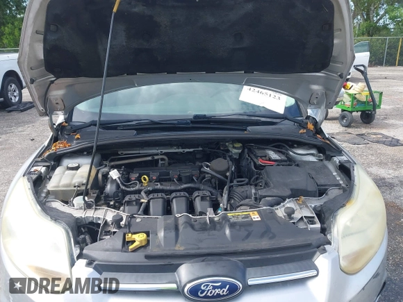 2013 Ford Focus SE with VIN 1FADP3F28DL217636, listed as a IAAI auction lot 42465123 with 187,088 mi miles and . Bid and sale history available at DreamBid. Image 10.