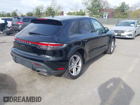 2023 Porsche Macan with VIN WP1AA2A58PLB16724, listed as a IAAI auction lot 41938233 with 19,660 mi miles. Bid and sale history available at carsss.com. Image 4.