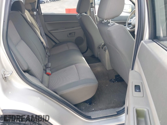 2008 Jeep Grand Cherokee Laredo with VIN 1J8GR48K88C107253, listed as a IAAI auction lot 42018165 with 239,222 mi miles. Bid and sale history available at carsss.com. Image 8.