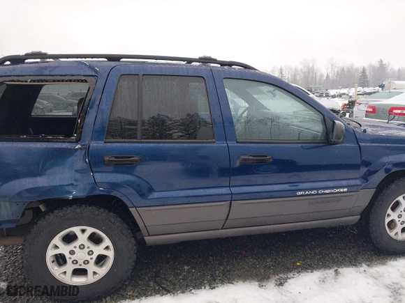 2001 Jeep Grand Cherokee Laredo with VIN 1J4GW48N21C730703, listed as a IAAI auction lot 41581667 with 111,054 mi miles. Bid and sale history available at carsss.com. Image 14.