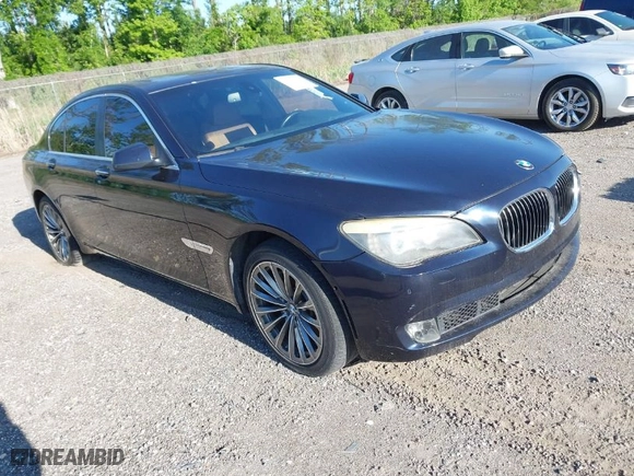 2011 BMW 7 Series 740i with VIN WBAKA4C52BC392112, listed as a IAAI auction lot 41736939 with 125,953 mi miles. Bid and sale history available at carsss.com. Image 1.