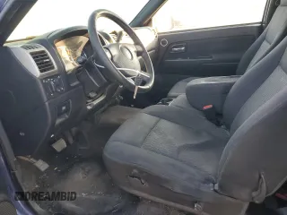 2009 Chevrolet Colorado Work Truck z VIN 1GCCS199498113463, wystawiony jako Copart lot #87432724 z przebiegiem 141 486 mil mil oraz Czysty tytuł • Clean title. Historia ofert i sprzedaży dostępna na DreamBid. Obrazek 7.