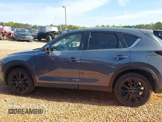 2023 Mazda CX-5 S Preferred with VIN JM3KFBCM3P0154043, listed as a IAAI auction lot 41928648 with 41,904 mi miles and . Bid and sale history available at carsss.com. Image 14.