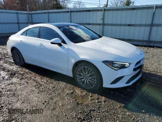 2021 Mercedes-Benz CLA with VIN W1K5J4HBXMN199220, listed as a Copart auction lot 86673214 with 29,801 mi miles and Salvage Title. Bid and sale history available at carsss.com. Image 4.