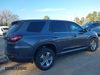 2023 Honda Pilot EX-L with VIN 5FNYG1H5XPB044829, listed as a IAAI auction lot 41396208 with 15,277 mi miles and . Bid and sale history available at DreamBid. Image 4.