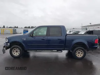 2003 Ford F-150 XLT with VIN 1FTRW08L33KC62060, listed as a IAAI auction lot 41618936 with 276,251 mi miles. Bid and sale history available at carsss.com. Image 14.
