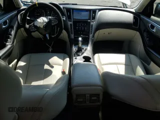 2015 Infiniti Q50 Premium with VIN JN1BV7AP7FM337221, listed as a Copart auction lot 50539345 with 113,075 mi miles and Salvage Title. Bid and sale history available at DreamBid. Image 8.