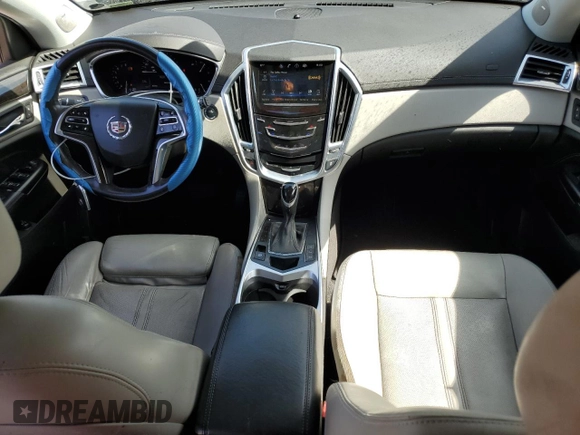 2015 Cadillac SRX Luxury Collection z VIN 3GYFNBE34FS541817, wystawiony jako Copart lot #58386685 z przebiegiem 51 731 mil mil oraz Szkoda całkowita • Salvage title. Historia ofert i sprzedaży dostępna na DreamBid. Obrazek 8.