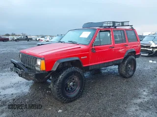 1996 Jeep Cherokee Sport with VIN 1J4FJ68S4TL244893, listed as a IAAI auction lot 41190369 with 192,459 mi miles and . Bid and sale history available at DreamBid. Image 2.