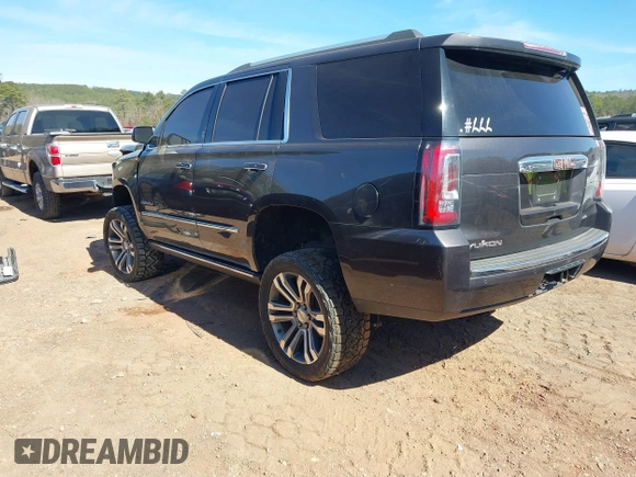 2018 GMC Yukon Denali with VIN 1GKS2CKJ6JR303263, listed as a IAAI auction lot 41633514 with 130,990 mi miles. Bid and sale history available at carsss.com. Image 3.