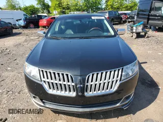 2010 Lincoln MKZ z VIN 3LNHL2GCXAR751058, wystawiony jako Copart lot #58390005 z przebiegiem 61 452 mil mil oraz Szkoda całkowita • Salvage title. Historia ofert i sprzedaży dostępna na DreamBid. Obrazek 5.