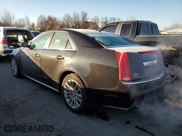 2013 Cadillac CTS with VIN 1G6DM5E36D0173553, listed as a Copart auction lot 84142504 with 100,703 mi miles and Salvage Title. Bid and sale history available at DreamBid. Image 2.