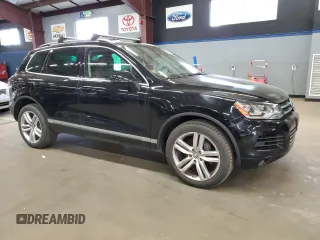 2012 Volkswagen Touareg Sport z VIN WVGEF9BP9CD011879, wystawiony jako Copart lot #56903035 z przebiegiem 198 262 mil mil oraz Czysty tytuł • Clean title. Historia ofert i sprzedaży dostępna na DreamBid. Obrazek 4.