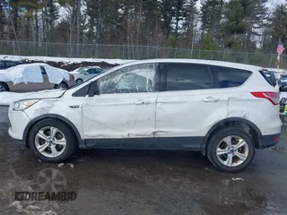 2014 Ford Escape SE with VIN 1FMCU9GX7EUD76778, listed as a IAAI auction lot 41679482 with 136,832 mi miles and . Bid and sale history available at carsss.com. Image 15.