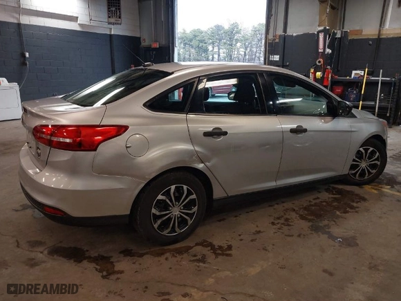 2016 Ford Focus S with VIN 1FADP3E22GL390039, listed as a IAAI auction lot 41958137 with 83,411 mi miles. Bid and sale history available at carsss.com. Image 4.