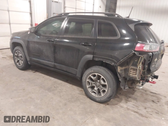 2020 Jeep Cherokee Trailhawk z VIN 1C4PJMBX4LD507364, wystawiony jako IAAI lot #41202333 z przebiegiem 90 000 mil mil oraz . Historia ofert i sprzedaży dostępna na DreamBid. Obrazek 3.