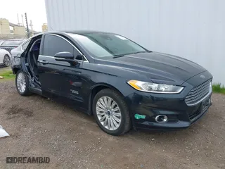 2014 Ford Fusion Energi Titanium with VIN 3FA6P0SU9ER256754, listed as a IAAI auction lot 41719036 with 119,530 mi miles. Bid and sale history available at carsss.com. Image 1.