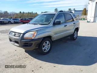 2005 Kia Sportage LX with VIN KNDJE723757081826, listed as a IAAI auction lot 41775450 with 106,992 mi miles and . Bid and sale history available at carsss.com. Image 2.