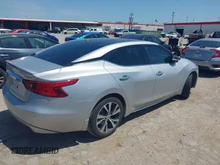 2016 Nissan Maxima SL with VIN 1N4AA6AP1GC430988, listed as a IAAI auction lot 42047844 with 122,685 mi miles and . Bid and sale history available at DreamBid. Image 4.