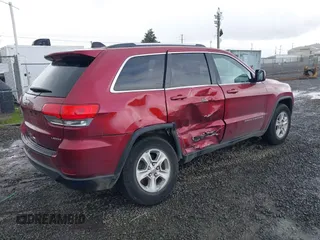 2014 Jeep Grand Cherokee Laredo with VIN 1C4RJFAG7EC213469, listed as a IAAI auction lot 41825075 with 163,417 mi miles. Bid and sale history available at carsss.com. Image 4.