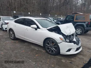 2015 Mazda 6 i Touring with VIN JM1GJ1V66F1173314, listed as a IAAI auction lot 41101860 with 160,338 mi miles. Bid and sale history available at carsss.com. Image 1.