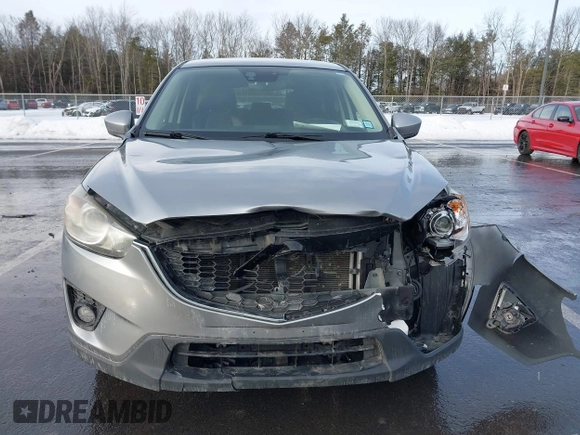 2014 Mazda CX-5 Grand Touring with VIN JM3KE2DY8E0304911, listed as a IAAI auction lot 41672197 with 77,523 mi miles. Bid and sale history available at carsss.com. Image 12.