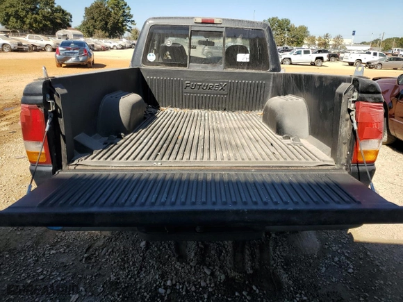 1995 Ford Ranger Splash with VIN 1FTCR14X2STA61772, listed as a Copart auction lot 77033104 with 129,784 mi miles and Salvage Title. Bid and sale history available at carsss.com. Image 10.