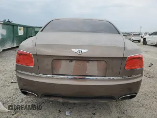 2014 Bentley Flying Spur с VIN SCBEC9ZA9EC091162, выставлен на аукционе Copart как лот 55941855 с пробегом 135 032 миль миль и Списание • Salvage title. История ставок и продаж доступна на DreamBid. Изображение 6.