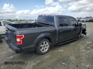2018 Ford F-150 XL with VIN 1FTEW1CP7JKE15048, listed as a Copart auction lot 51328255 with 146,938 mi miles and Salvage Title. Bid and sale history available at carsss.com. Image 3.