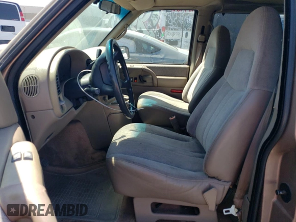 1996 GMC Safari z VIN 1GKDM19W3TB510312, wystawiony jako Copart lot #69528134 z przebiegiem 106 226 mil mil oraz Szkoda całkowita • Salvage title. Historia ofert i sprzedaży dostępna na DreamBid. Obrazek 7.