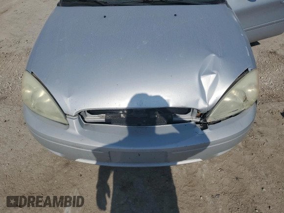 2004 Ford Taurus SE with VIN 1FAFP53U04G133586, listed as a Copart auction lot 59972925 with 228,938 mi miles and Salvage title. Bid and sale history available at DreamBid. Image 11.